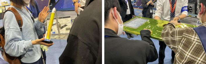 ロケットの模型や断熱材を触る様子.png